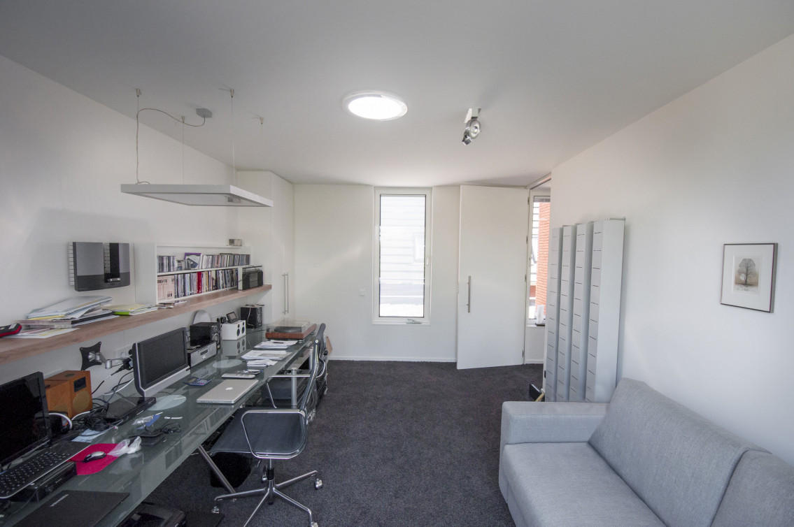 What is the importance of good lighting in the home workplace