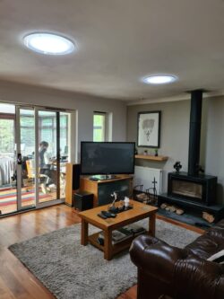 Pipe sun light from a light tunnel in to a living room