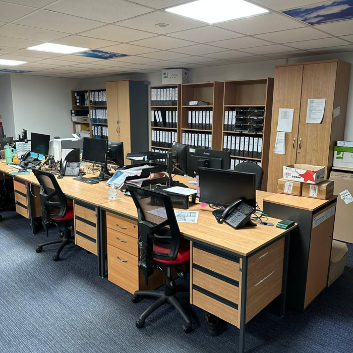 Solatube commercial daylighting systems providing natural daylight in a modern office.